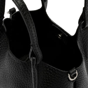 Close-up of a black leather handbag with visible stitching details.