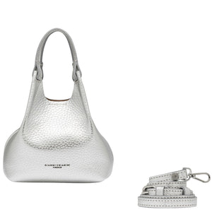 Silver handbag with matching strap on a white background