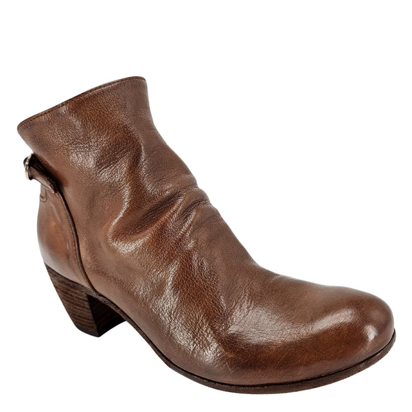 Brown leather ankle boot on a white background