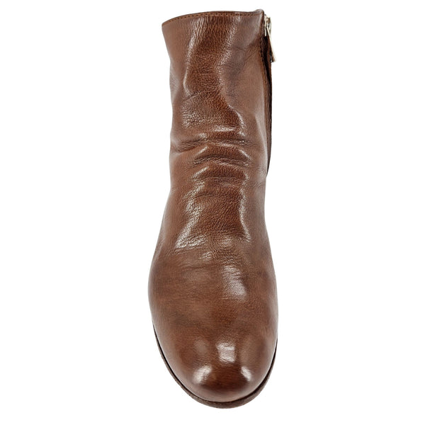 Brown leather ankle boot on a white background