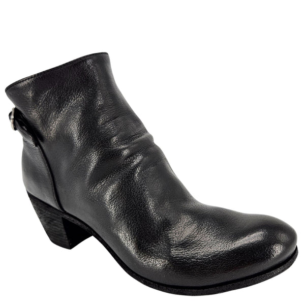 Black leather ankle boot on a white background