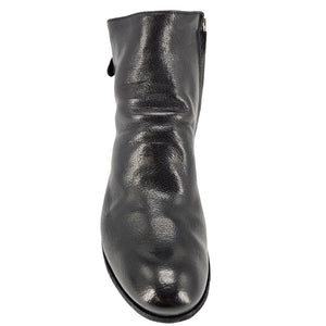 Black leather ankle boot on a white background