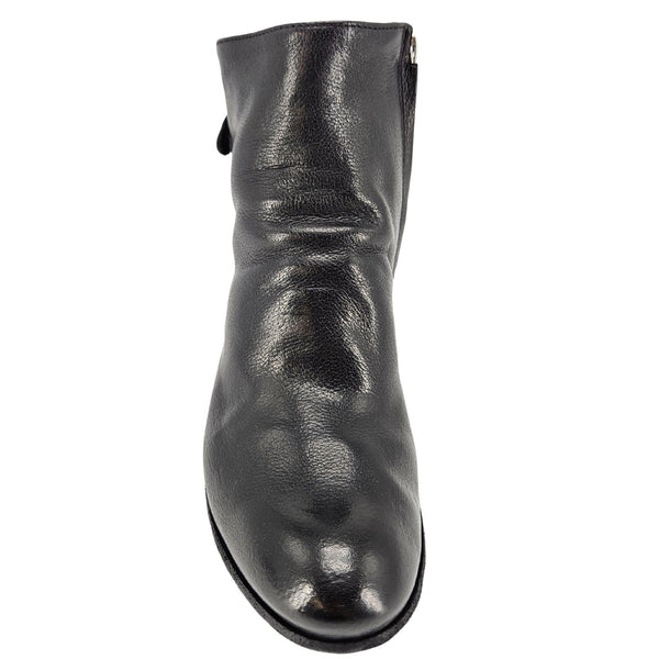 Black leather ankle boot on a white background