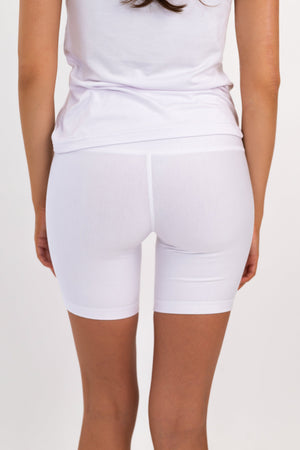 Model wearing The Core Short 5” in Cloud by ON/OFF Essentials, made from 95% bamboo.