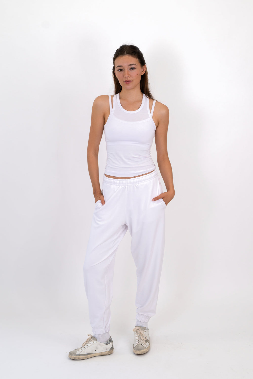 Model wearing The Solace Sweatpant in Cloud by ON/OFF Essentials, made from 95% bamboo fleece.