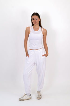 Model wearing The Solace Sweatpant in Cloud by ON/OFF Essentials, made from 95% bamboo fleece.