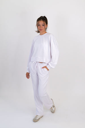 Model wearing The Solace Crew Neck in Cloud by ON/OFF Essentials, made from 95% bamboo fleece.