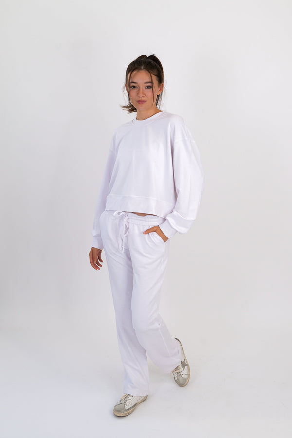 Model wearing The Solace Crew Neck in Cloud by ON/OFF Essentials, made from 95% bamboo fleece.