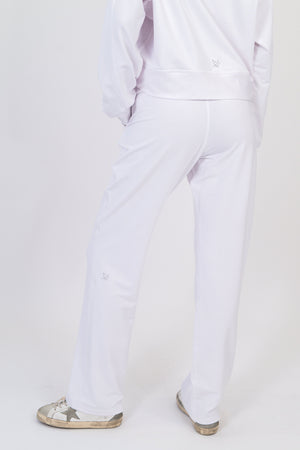 Model wearing The Solace Wide Leg Sweatpant in Cloud by ON/OFF Essentials, made from 95% bamboo fleece.