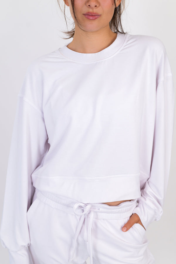 Model wearing The Solace Crew Neck in Cloud by ON/OFF Essentials, made from 95% bamboo fleece.