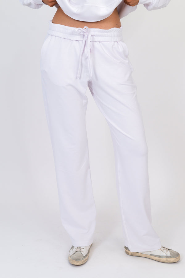 Model wearing The Solace Wide Leg Sweatpant in Cloud by ON/OFF Essentials, made from 95% bamboo fleece.