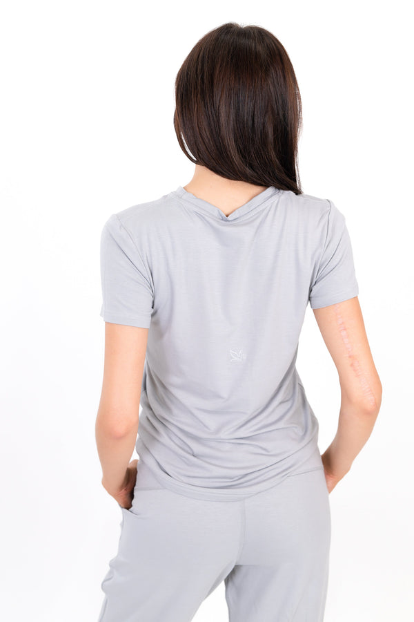 Model wearing The Everyday Tee in Fog by ON/OFF Essentials, made from 95% bamboo.