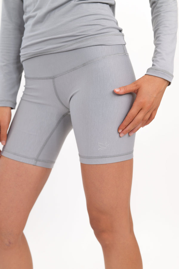 Model wearing The Core Short 5” in Fog by ON/OFF Essentials, made from 95% bamboo.