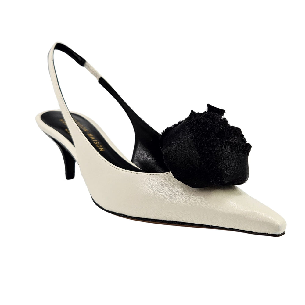 Beige leather slingback kitten heel with black fabric flower accent