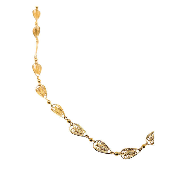 Goldtone leaf link necklace with connected oval teardrop panels and clasped ends