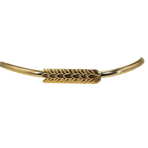 Goldtone stretch belt with textured wheat-pattern centerpiece and snake clasp.