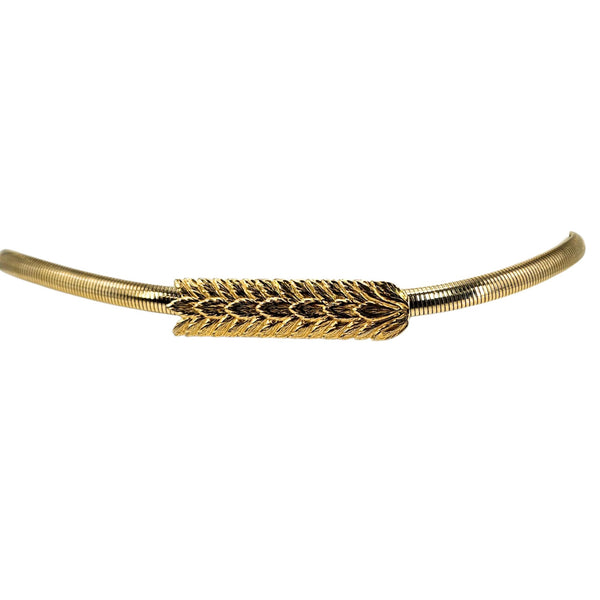 Goldtone stretch belt with textured wheat-pattern centerpiece and snake clasp.