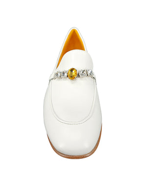 A leather loafer with a low stacked heel and rounded toe, featuring a decorative band adorned with faceted gemstone-style embellishments across the upper. Designed by Madison in Beverly Hills and handcrafted in Italy