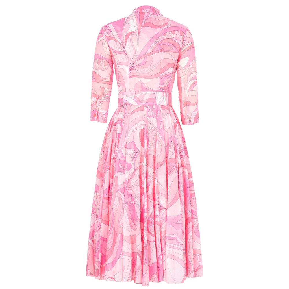 Women's soft pink graphic shirt dress with long sleeves, buttons, and waist belt