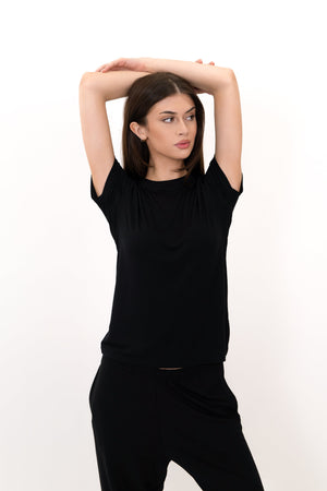 Model wearing The Everyday Tee in Onyx by ON/OFF Essentials, made from 95% bamboo.
