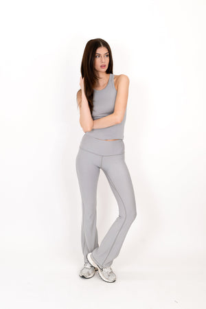 Model wearing The Core Flare Legging in Fog by ON/OFF Essentials, made from 95% bamboo.