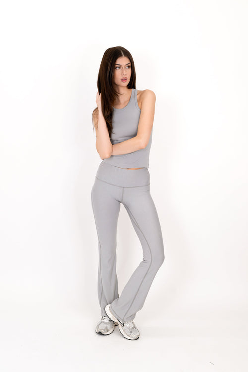 Model wearing The Core Flare Legging in Fog by ON/OFF Essentials, made from 95% bamboo.