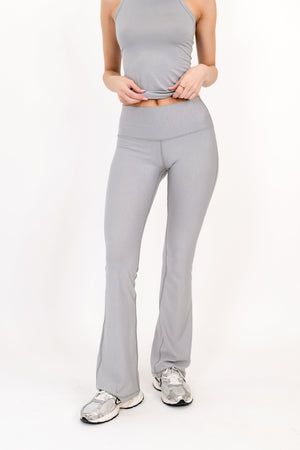 Model wearing The Core Flare Legging in Fog by ON/OFF Essentials, made from 95% bamboo.