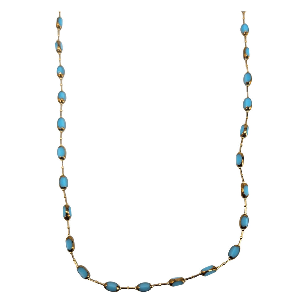 Turquoise oval bead necklace with gold-tone accents, long strand