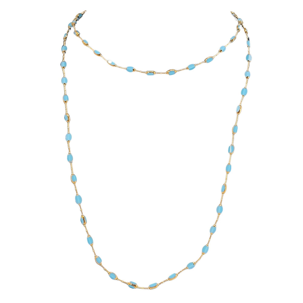 Turquoise oval bead necklace with gold-tone accents, long strand