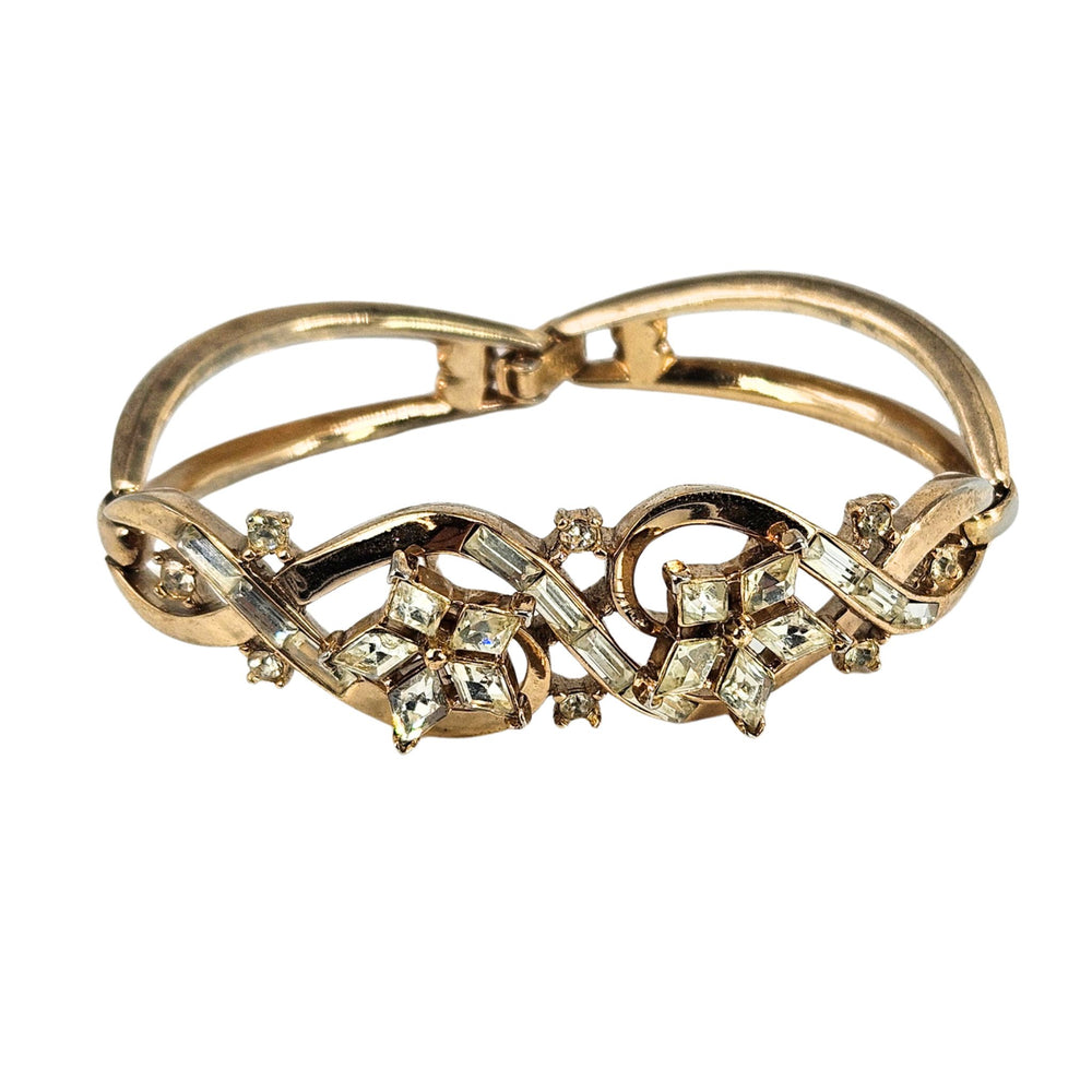 Gold rhinestone bracelet with flower motif and marquise and round crystal accents