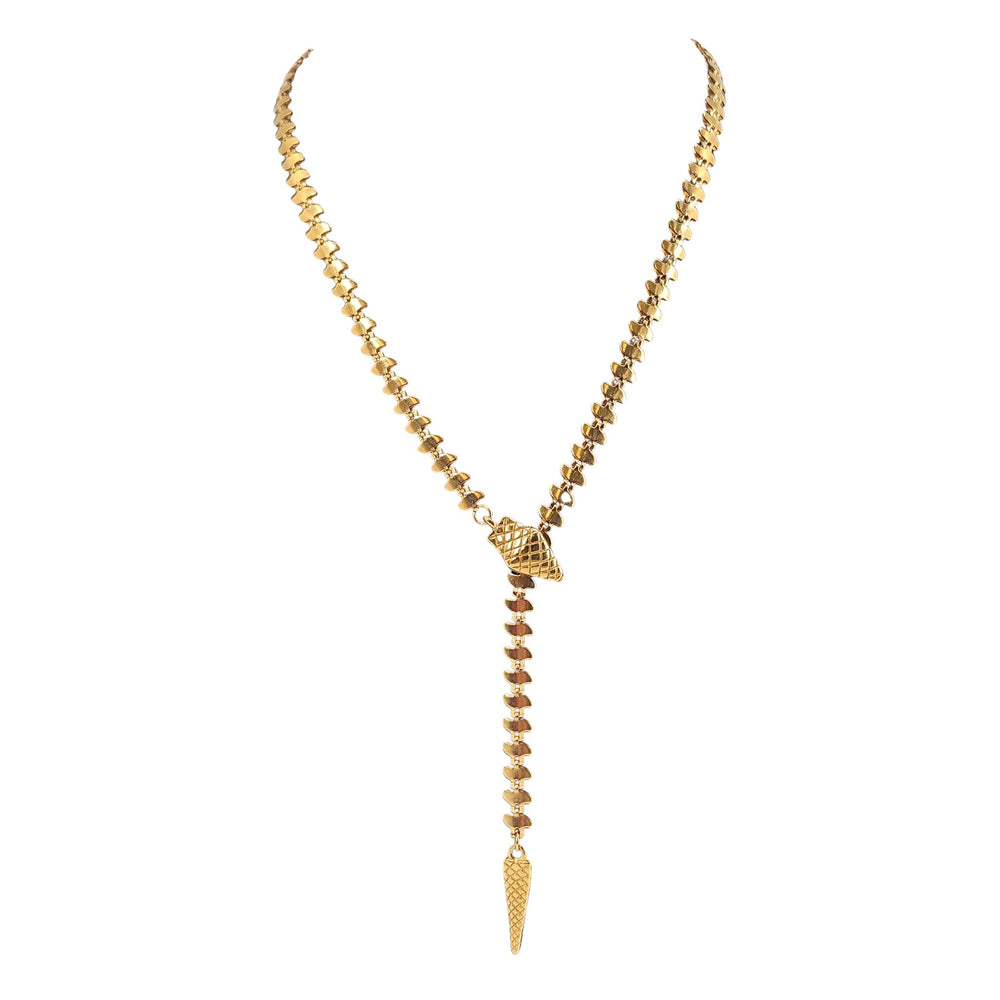 Goldtone snake-link lariat necklace with lattice pendant and pointed drop tail