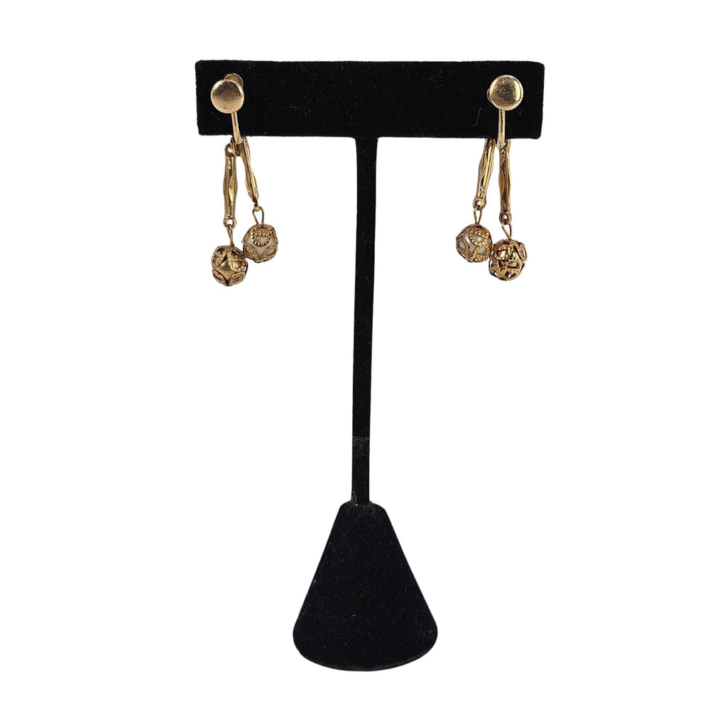 Gold filigree faux pearl drop earrings with dangling heart and coin charms