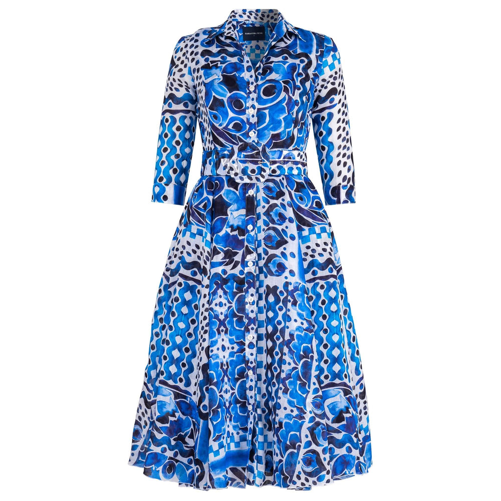 Blue and white patterned dress on a white background