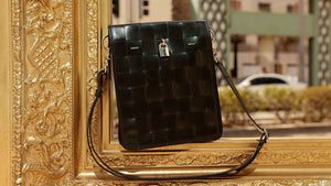 Luxury leather handbags, 100% handmade in Italy, featuring a signature center lock and elegant designs by Madison of Beverly Hills.