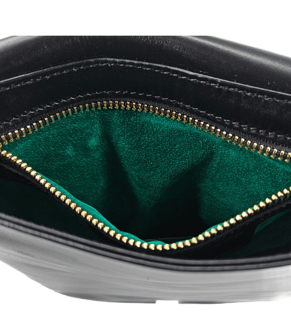 Luxury leather handbags, 100% handmade in Italy, featuring a signature center lock and elegant designs by Madison of Beverly Hills.