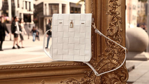 Luxury leather handbags, 100% handmade in Italy, featuring a signature center lock and elegant designs by Madison of Beverly Hills.