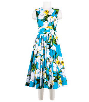 A knee-length dress with a collared neckline, three-quarter sleeves, and a flared skirt. Features a bold allover abstract pattern and fitted waist.