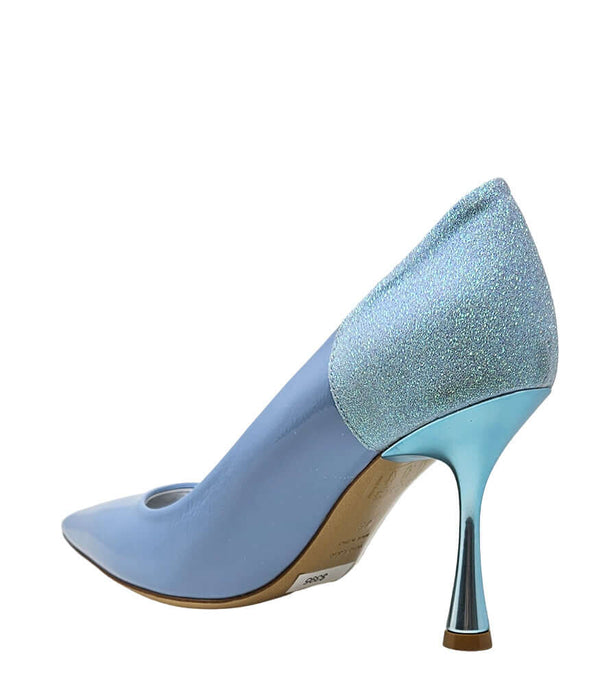 Pointed-toe pump handcrafted in Italy with a high heel, glossy finish, and a glitter-accented heel counter. Features a sculptural stiletto heel and metallic insole. Shown from multiple angles against a clean background - back view of alena blue and light blue