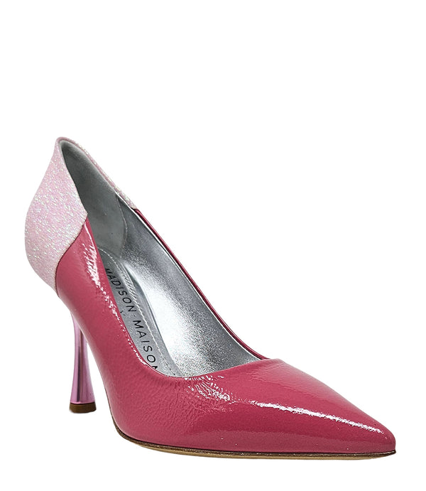 Pointed-toe pump handcrafted in Italy with a high heel, glossy finish, and a glitter-accented heel counter. Features a sculptural stiletto heel and metallic insole. Shown from multiple angles against a clean background