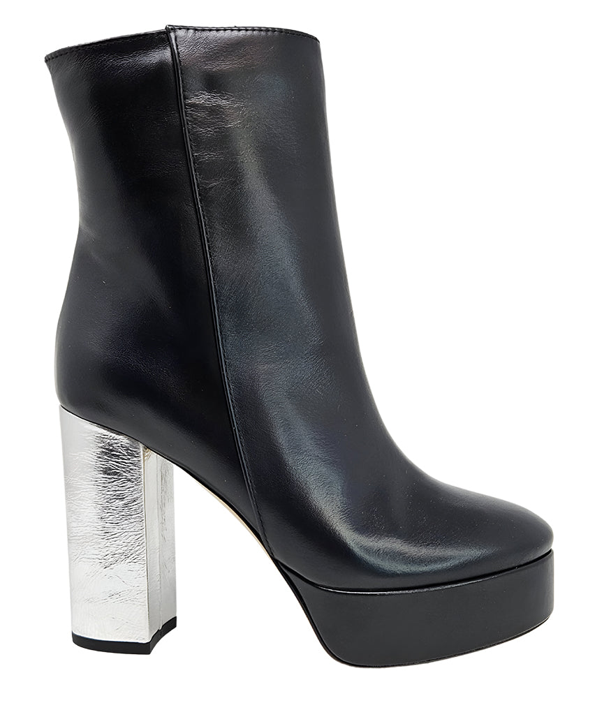 "High-heel ankle boot crafted from smooth premium leather with a sleek rounded toe, an inner side zipper for easy wear, a supportive leather-wrapped platform, and a sturdy metallic block heel. Designed with a soft leather lining and a durable leather sole