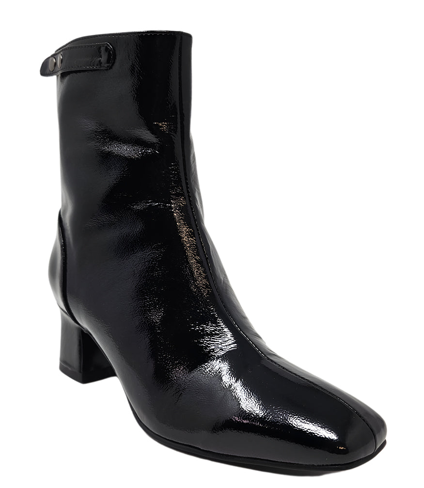 Black patent leather zip-up boot with mid block heel, side pull tab
