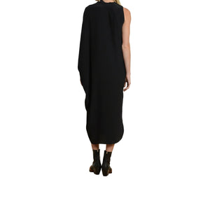 Black sleeveless dress worn by a person on a white background