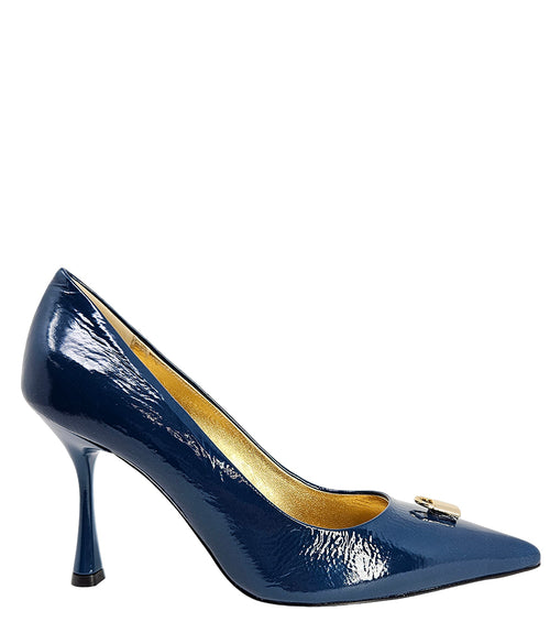 Pointed-toe stiletto pump with a sleek, glossy finish, mid-height heel, and gold lock embellishment at the toe. Features a sculpted silhouette and cushioned interior.