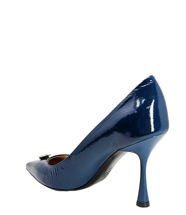 Pointed-toe stiletto pump with a sleek, glossy finish, mid-height heel, and gold lock embellishment at the toe. Features a sculpted silhouette and cushioned interior.
