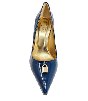 Pointed-toe stiletto pump with a sleek, glossy finish, mid-height heel, and gold lock embellishment at the toe. Features a sculpted silhouette and cushioned interior.