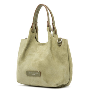 Beige handbag with brown handles on a white background