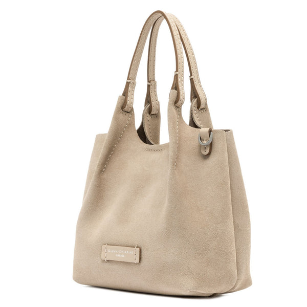 Beige handbag with a visible brand label on a white background