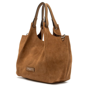 Brown suede handbag with a visible brand label on a white background