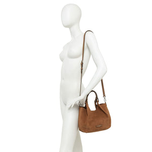 Brown handbag on a white mannequin against a white background