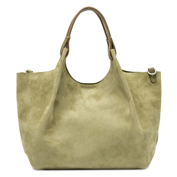 Green suede handbag with brown leather handle on a white background